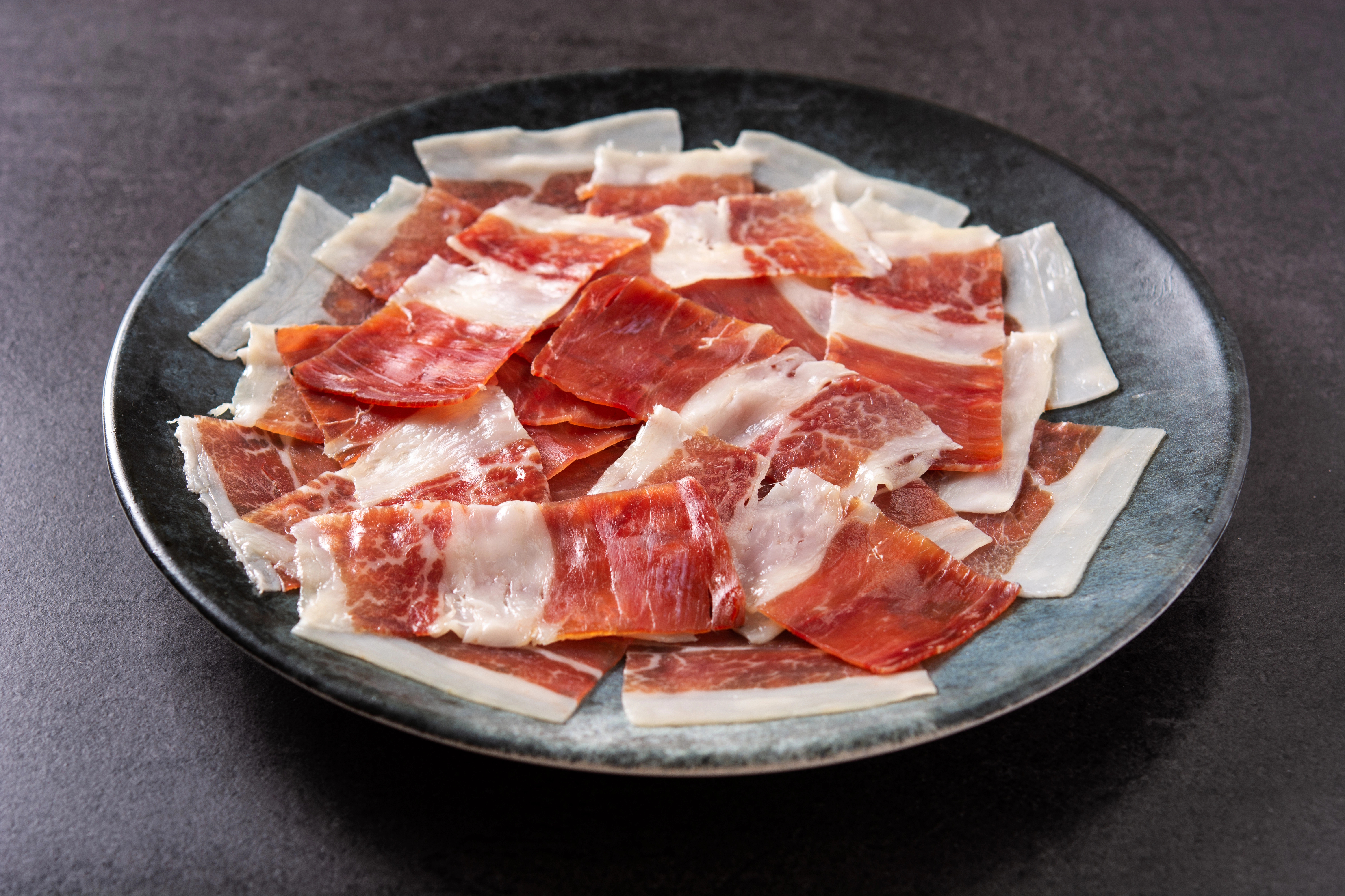 Jamón ibérico loncheado a mano